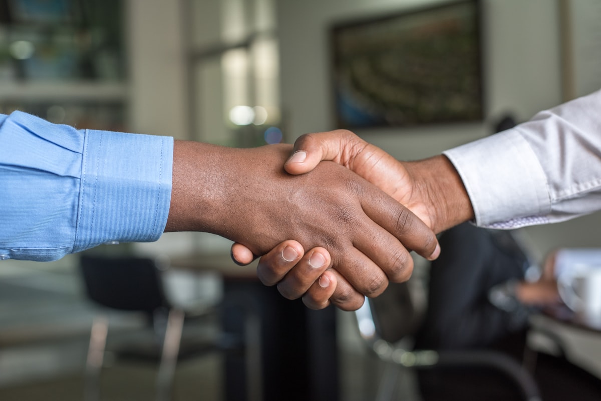 Project handover handshake between client and contractor
